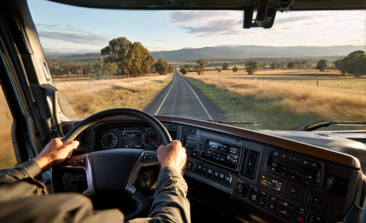 preston84547357_The_driver_is_driving_the_truck_on_an_empty_roa_4d31adb8-9f88-4261-a0bd-2e249c2ae71f