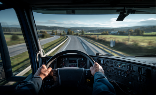preston84547357_The_driver_is_driving_the_truck_on_an_empty_roa_669f2d22-f888-408e-aa07-62164ae174f6